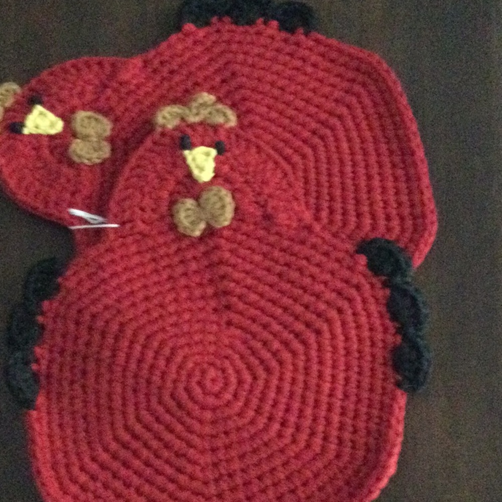 Handmade red and black hot pads or pot holders
